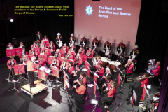 The Band on stage at the Roper Theatre, Bath, with the Devon & Somerset Corps of Drums in background.